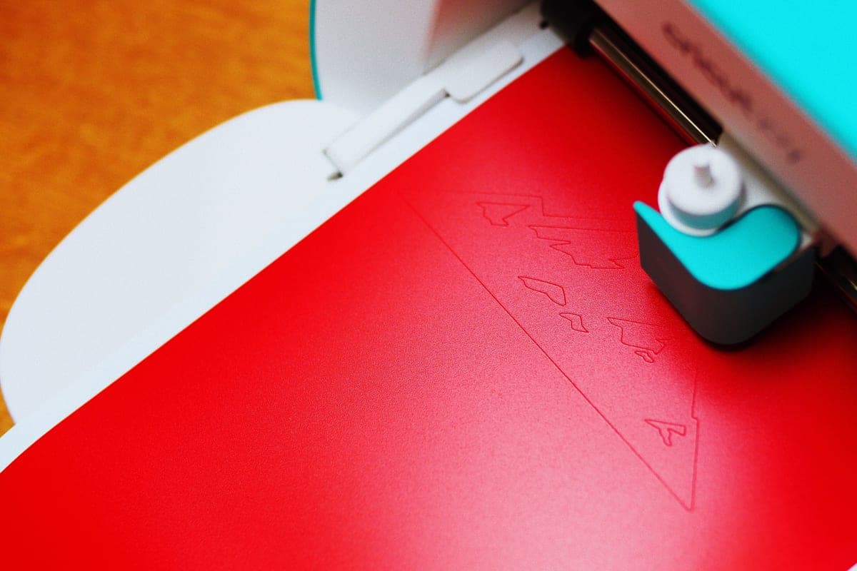 A desktop cutting plotter cutting vinyl lettering